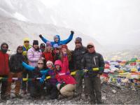 Trekkers posing for the camera at Everest base camp |  <i>Sally Imber</i>