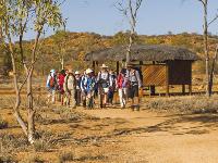 Trekkers embarking at the beginning of the Larapinta Trail, the old Telegraph Station -  Photo: Peter Walton Photography